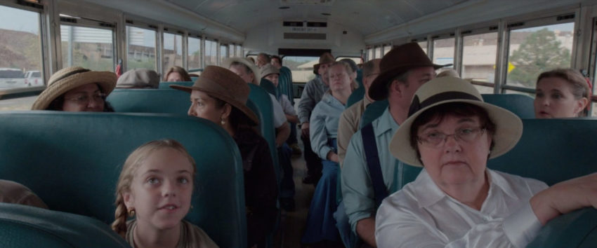 Reenactors on a bus in the film Bisbee '17